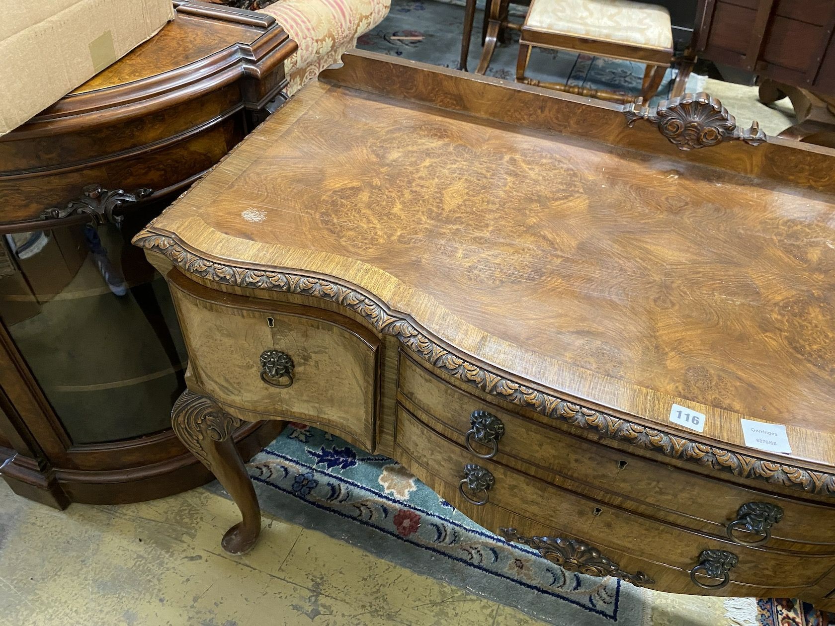 A Queen Anne walnut bowfront serving table, width 120cm depth 52cm height 90cm